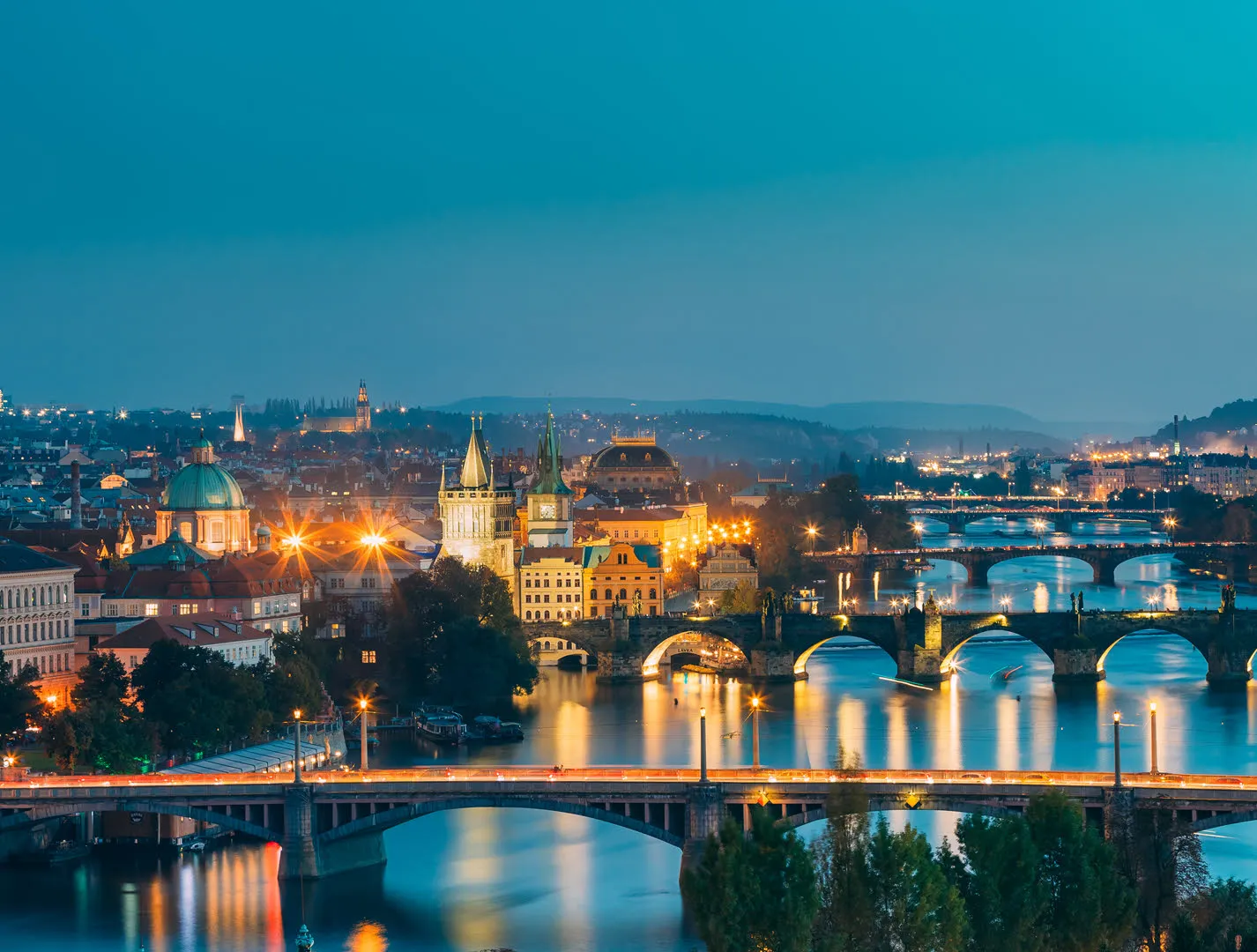Prague at dusk, the Vltava river and its bridges