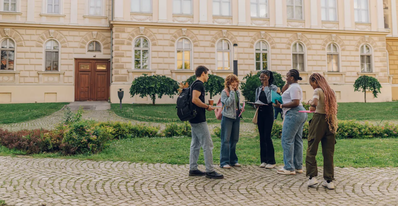 Students in front of a university building